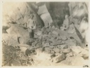 Image of Eskimo [Inughuit] girls down in stone fox trap